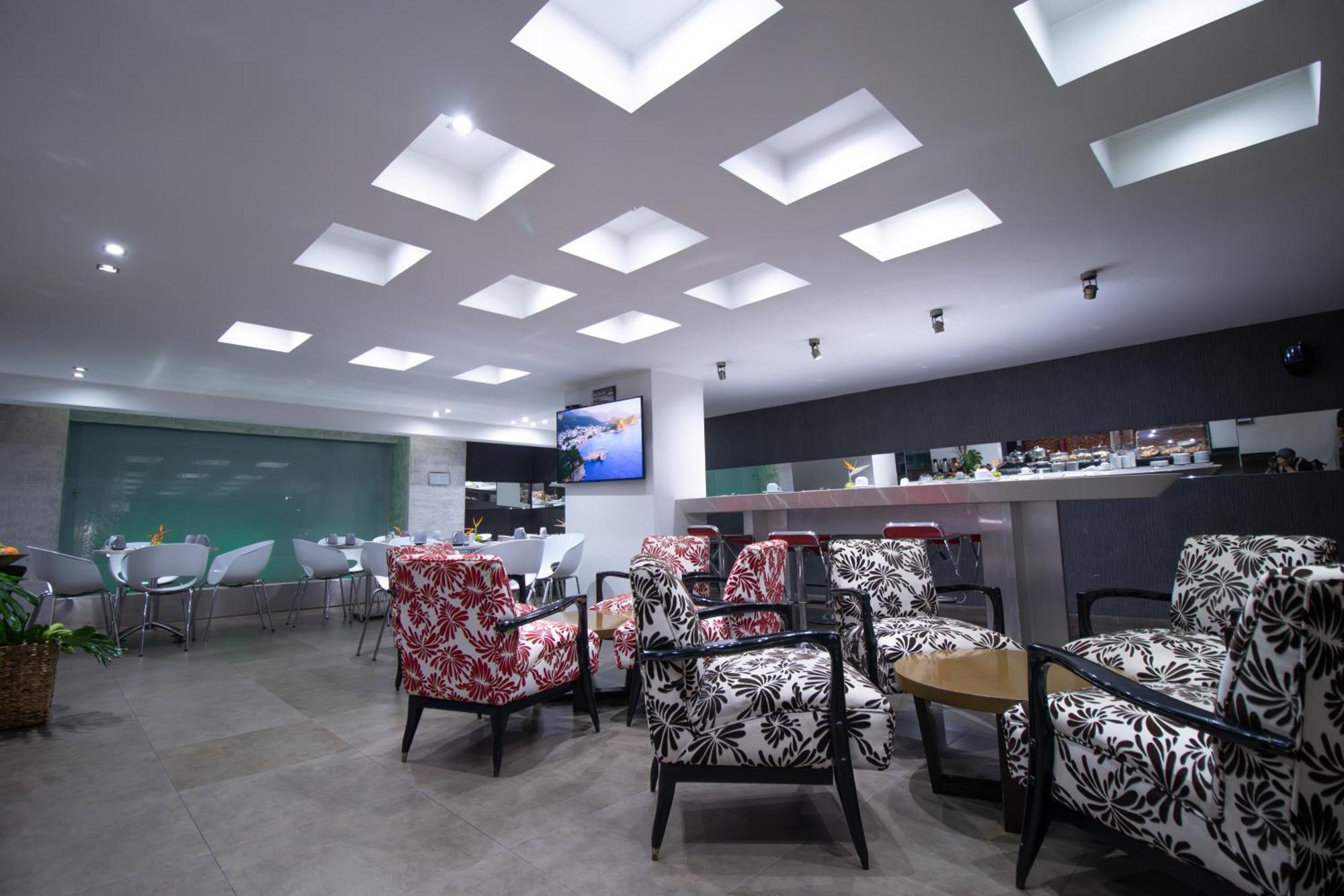 San Simon Hotel Pereira By Soratama Exterior photo The lounge at the airport.